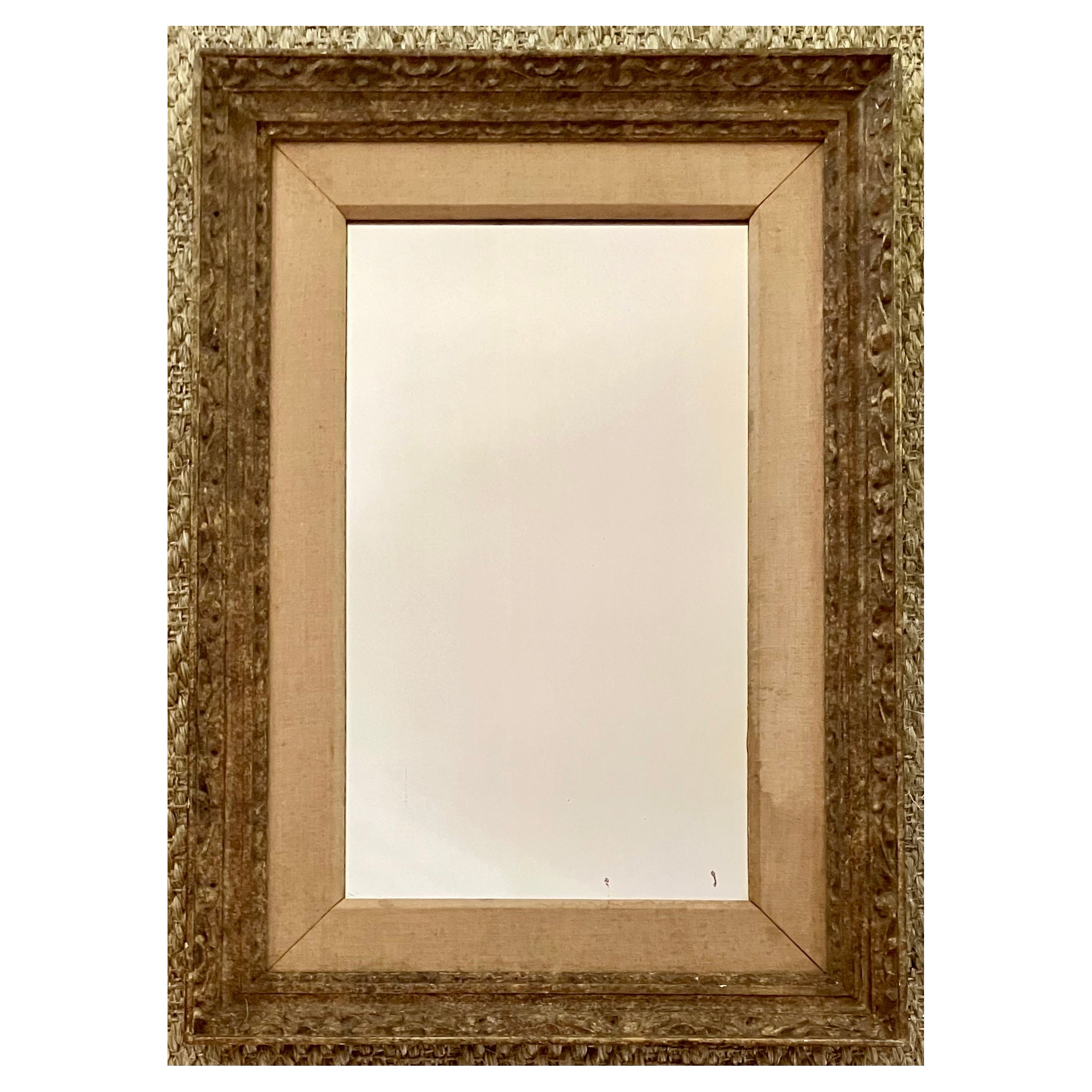 Miroir en bois sculpté bronzé en vente