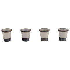 Bing & Grøndahl, Tema. Four egg cups in stoneware. From the 1970s.