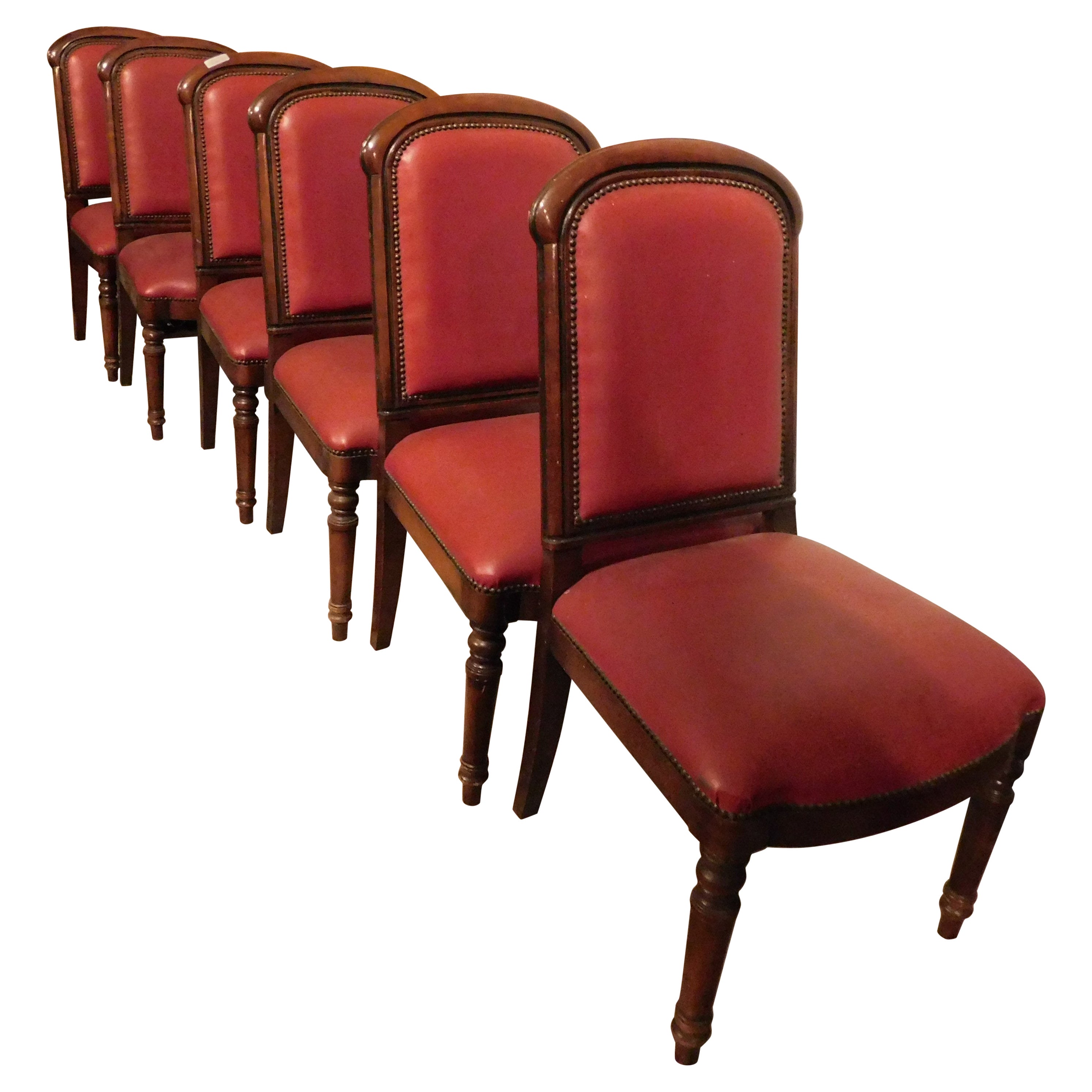 set of 6 walnut armchairs, upholstered in red leather, from an Italian theater