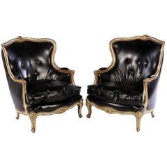 Striking Pair of Large French Louis XV Style Bergeres in Giltwood and Leather 
