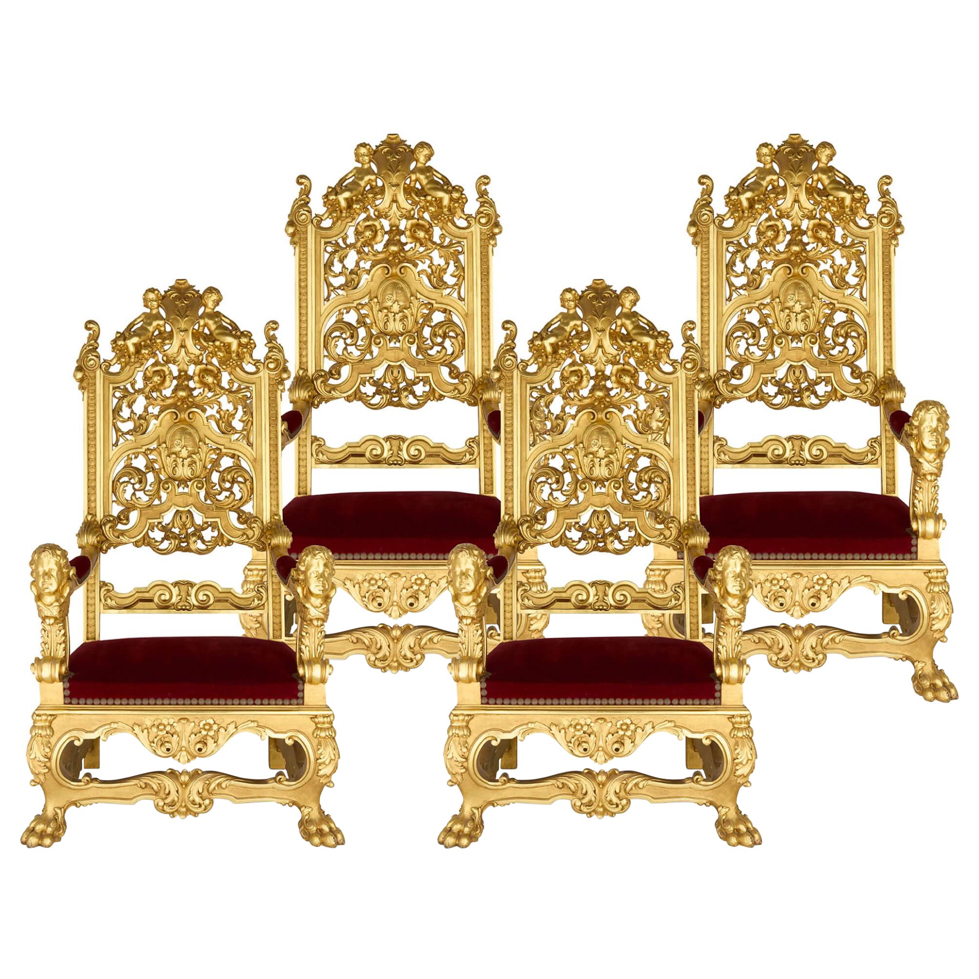 Set of Four Baroque Style Carved Giltwood and Velvet Throne Armchairs
