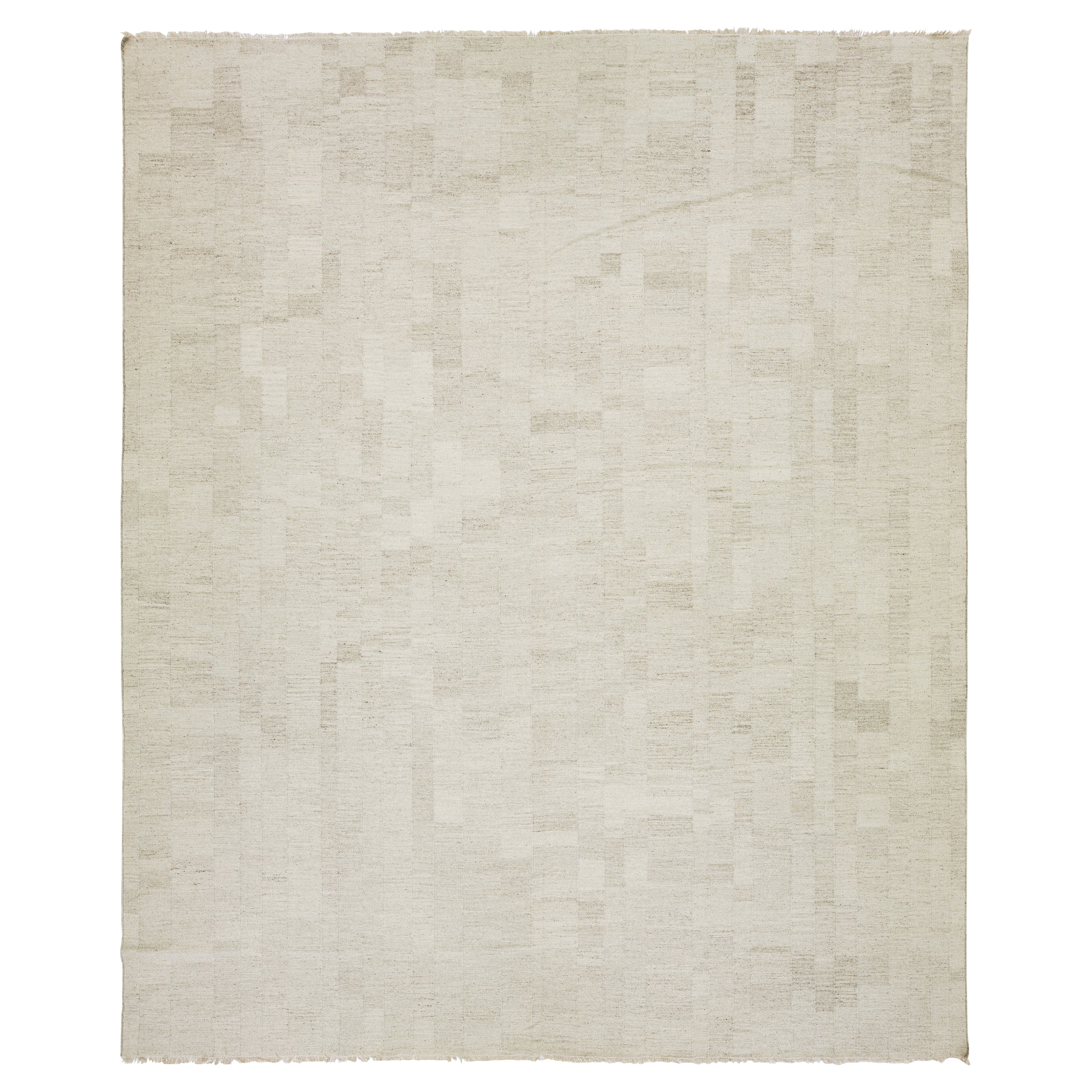Tapis Kilim tissé à plat dans des tons terreux naturels