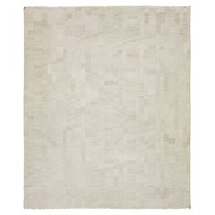 Tapis Kilim tissé à plat dans des tons terreux naturels