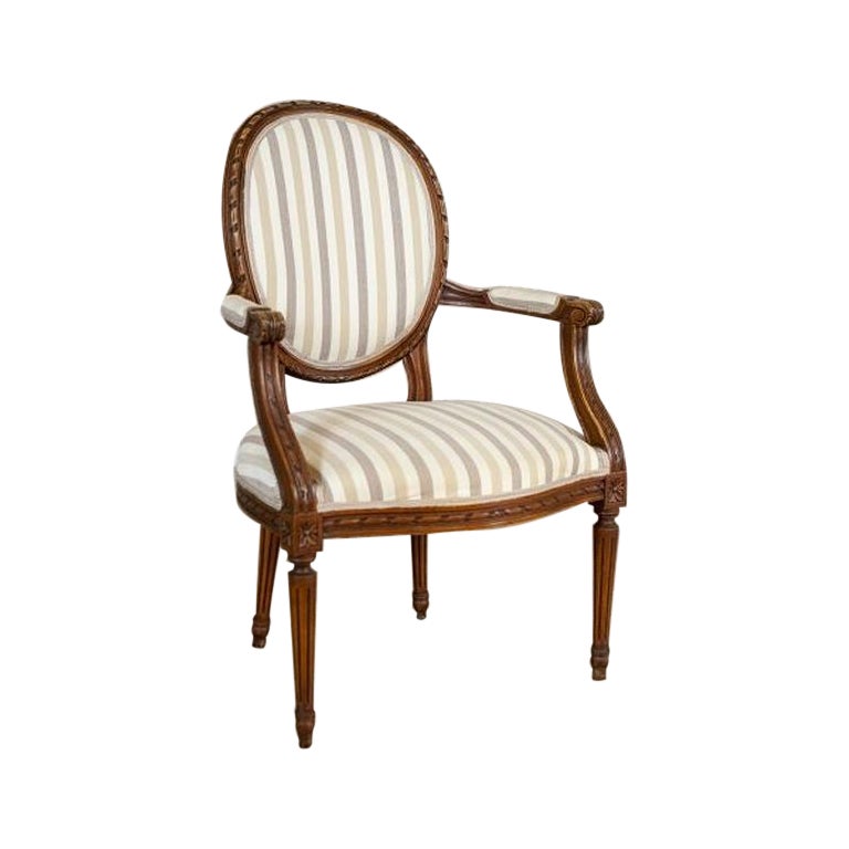 French Louis XVI Walnut Armchair From the Early 19th Century