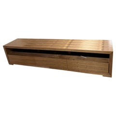 Modern walnut entertainment platform for TV  designed by Greg Sheres. In stock.