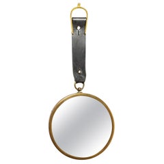 20th century art deco design leather and curved wall mirror att. Jacques Adnet