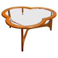 A mid century modern 3 leaf clover coffee table from the Stonehill Stateroom