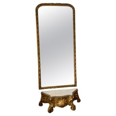 Tall giltwood framed pier mirror French 19 th c. With marble top console
