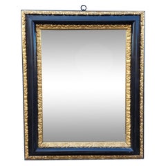 Blackened And Gilded Wooden Mirror, 17th Century