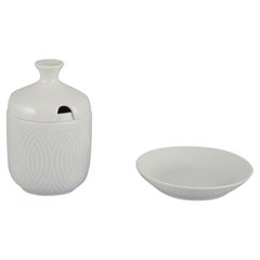 Axel Salto for Royal Copenhagen. Mustard pot and small bowl in porcelain.