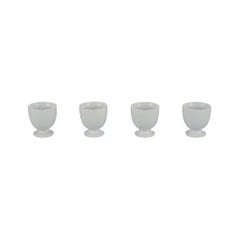 Axel Salto pour Royal Copenhagen. Quatre tasses à œuf en porcelaine blanche.