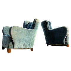 Pair of low back sculptural 1940ties Danish cabinetmaker armchairs