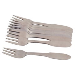 Georg Jensen "Mitra". Set of nine cake forks. Stainless steel.