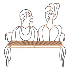 Iron and rattan bench