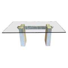 An Ello 1970s  travertine marble and glass dining table by  Guy Barker