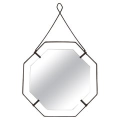 French 1960s octagonal mirror with wrought iron frame and hanging bar