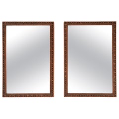 Pareja de espejos de pared con incrustaciones