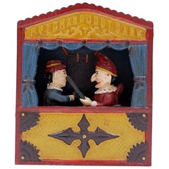 Cast Iron Book of Knowledge Mechanical Bank "Punch & Judy" 20th Century