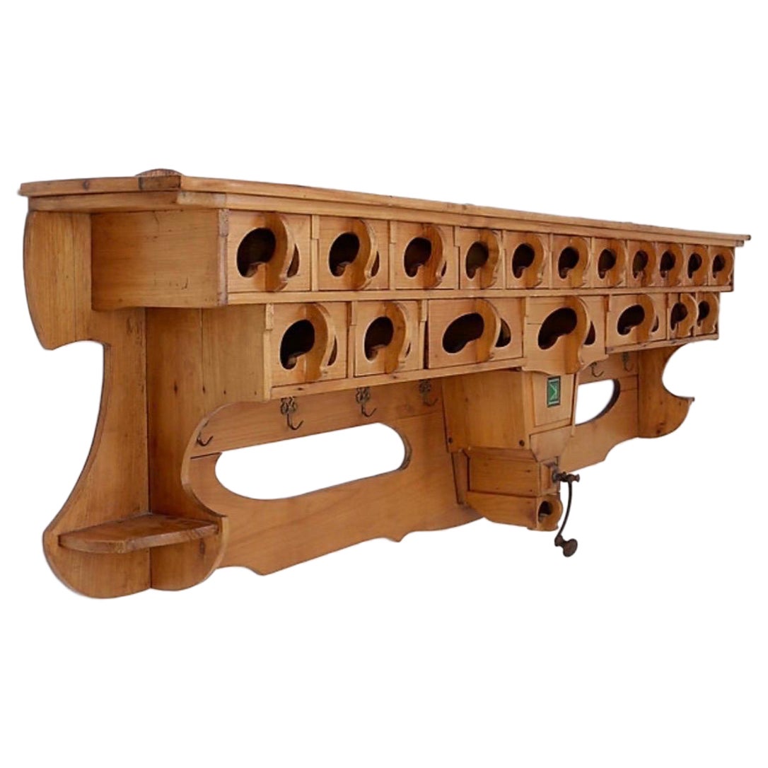 Kitchen rack / Archelle in sherry wood with 18 drawers and coffee grinder For Sale