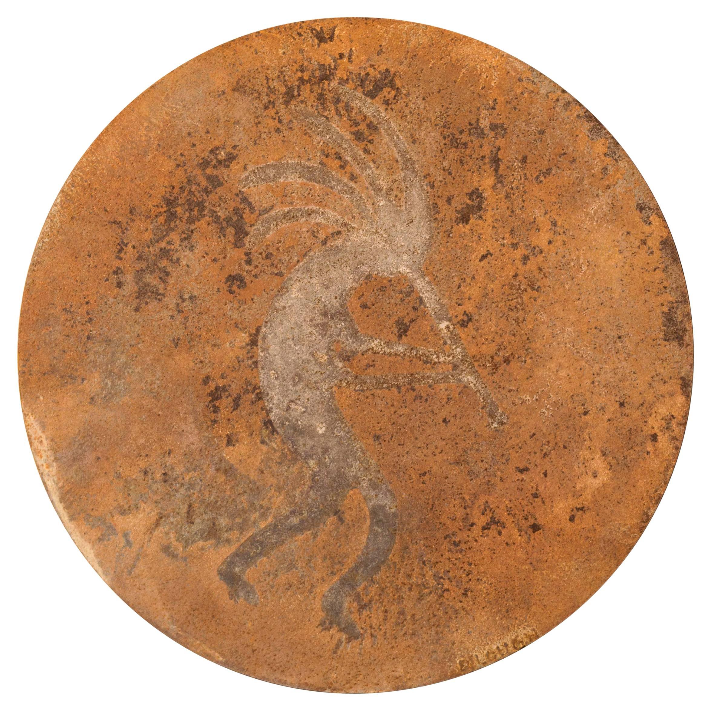 Steel Disc of a Mythic Desert Piper by Doug Lough