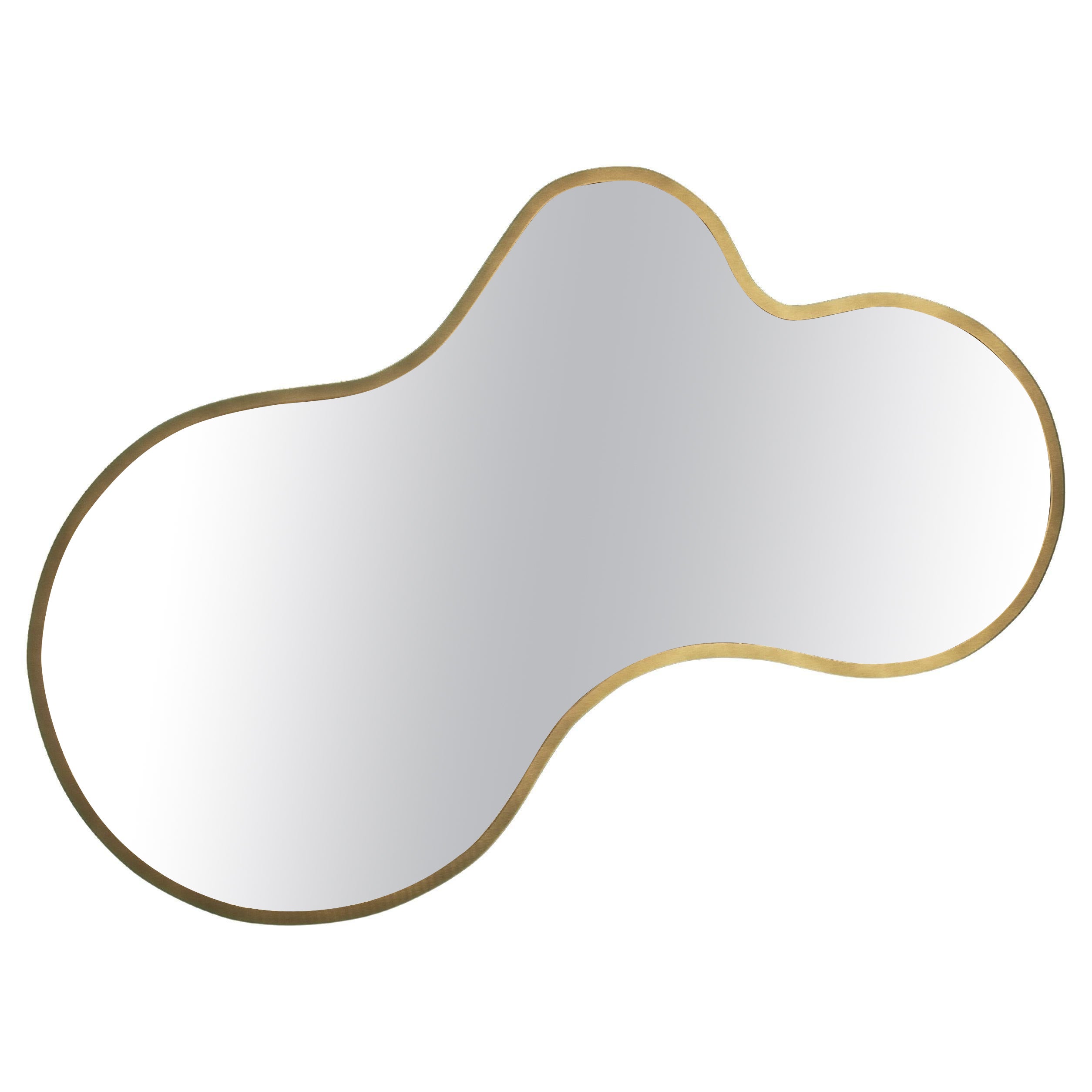 Free form mirror with brass frame