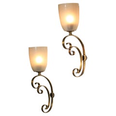 Pair of italian sconces in Murano glass on gilded metal structure 60's