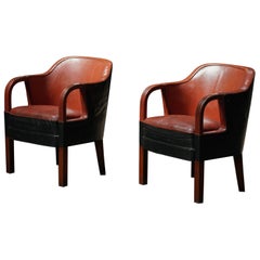 Pareja de sillones de cuero rojo