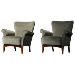 Pareja de sillones de terciopelo verde