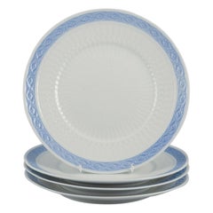 Royal Copenhagen Blue Fan, four porcelain dinner plates. 1960s/70s