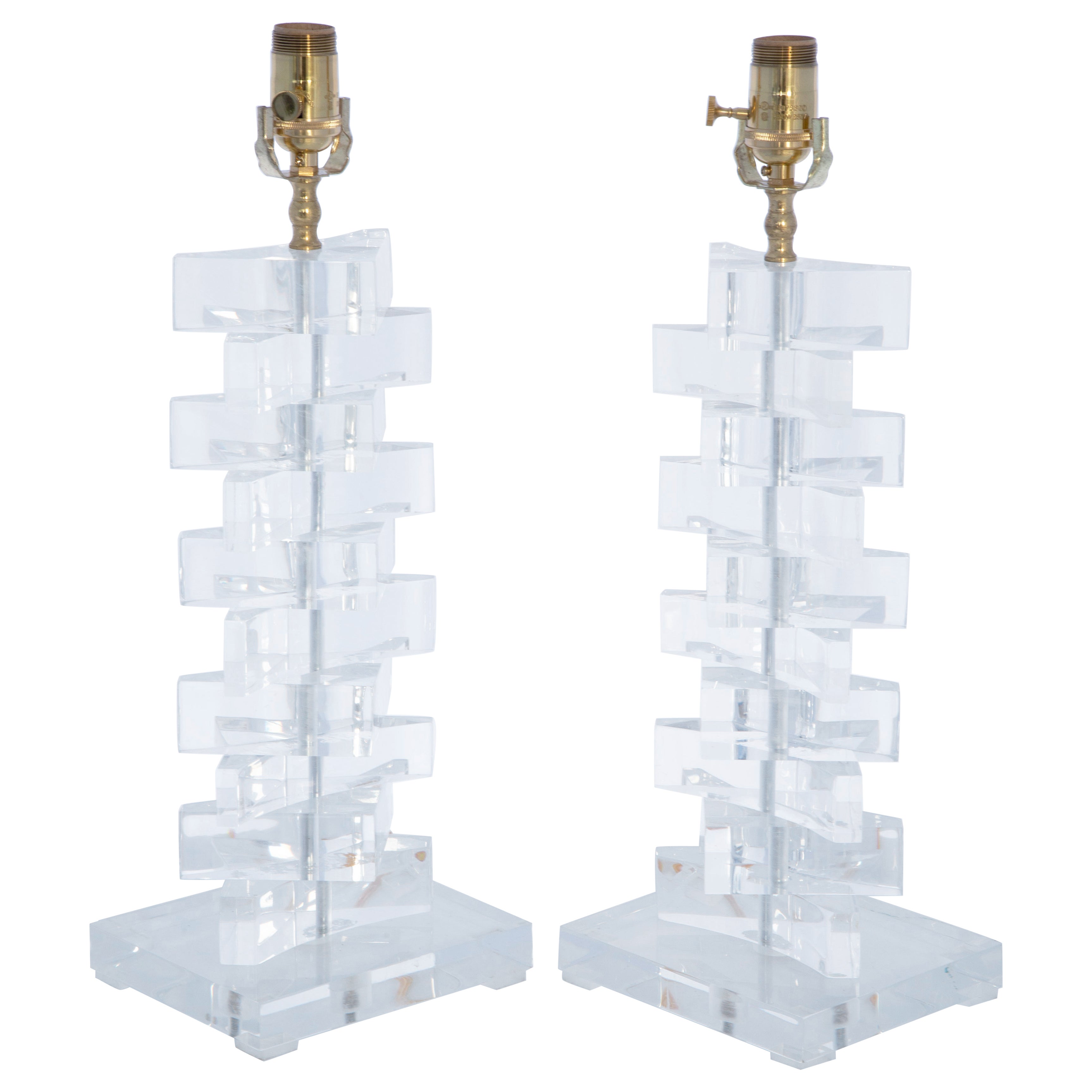 Pair of Springer Style Stacked Triangular Block Lamps of Lucite For Sale