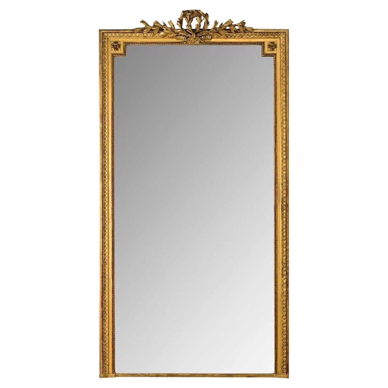 Grand miroir de cheminée français de style Louis XVI doré