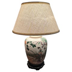 A wonderful late 19th century Chinese Porcelain Lamp w. Rosewood Base