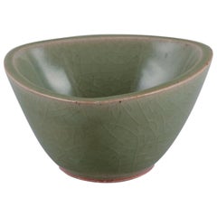 Jais Nielsen for Royal Copenhagen. Ceramic bowl in green glaze. From 1946
