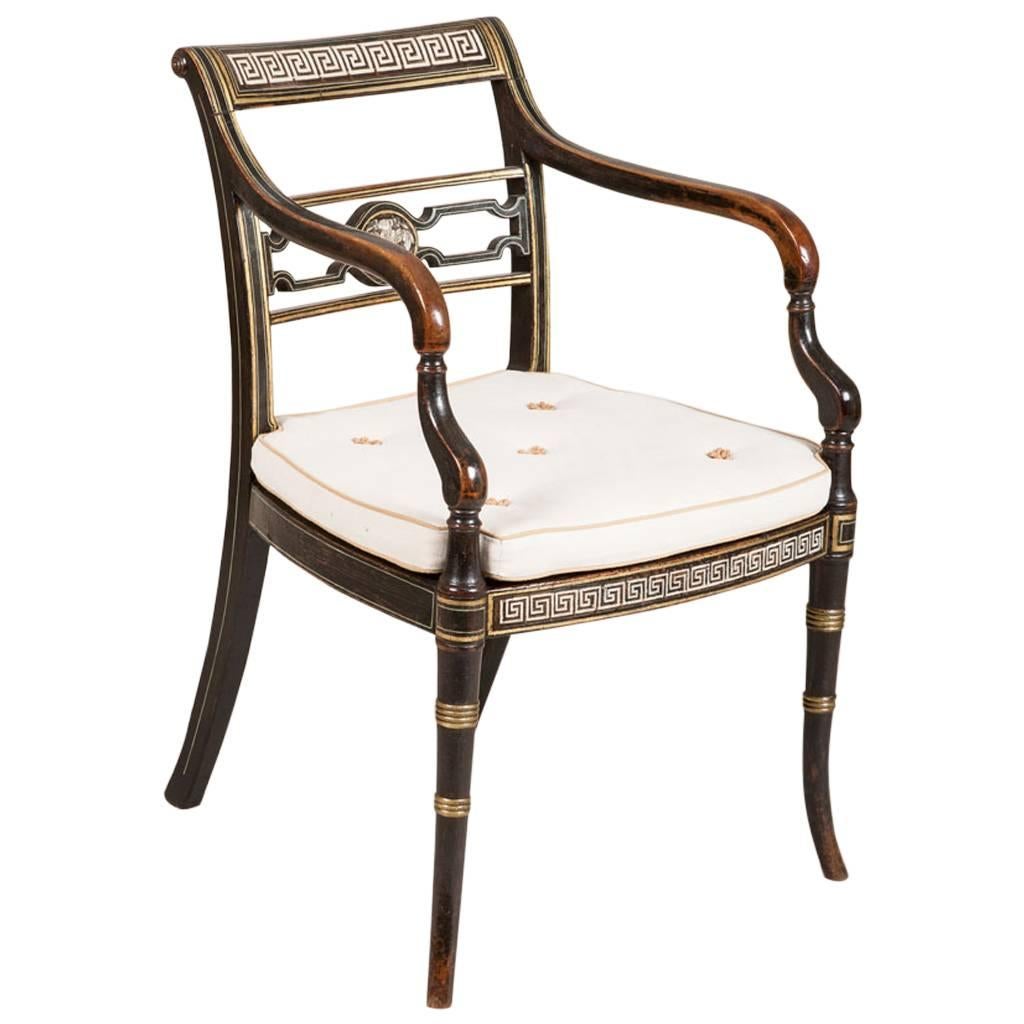 A Regency Black Painted Elbow Chair