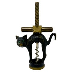 Tire-bouchon " chat noir " en laiton allemand de la société Monopol Usbeck, vers 1910-1930.
