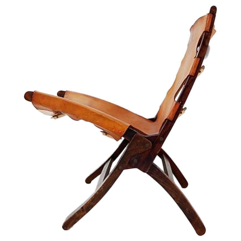 Mid century leather and wood folding armchair, 1950s For Sale