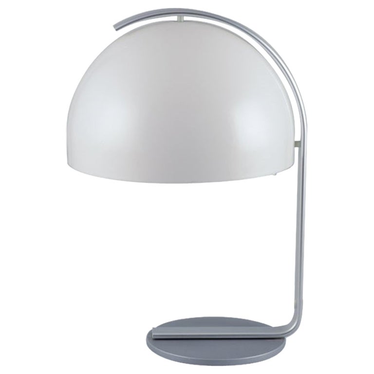 Bergboms, Sweden. Table lamp with metal frame and white acrylic shade.