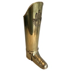 Paragüero de latón que representa una bota. Obra francesa. Alrededor de 1900