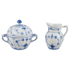 Royal Copenhagen Blue Fluted plain. Creamer and sugar bowl. Approx. 1930.