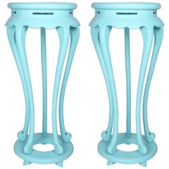 A pair of painted wood pedestals in the Chinese style, 20th century
