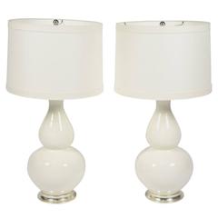 Pair of Christopher Spitzmiller Lamps in White with Silver Leaf Bases