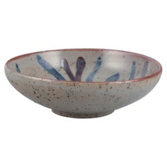 Gutte Eriksen for Nymølle. Small ceramic bowl. Glaze in blue and gray tones.