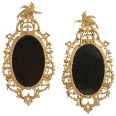 Pair of George III Carved Giltwood Oval Mirrors