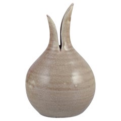 European studio ceramicist. Round vase with a two-part neck.