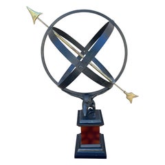 Reloj de sol armilar inglés vintage de hierro para jardín sostenido por un atlas