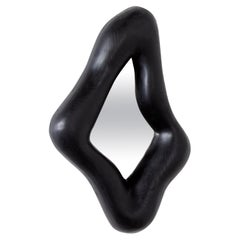 Brutalist sculptural black ebonised mirror by Christophe Daguet