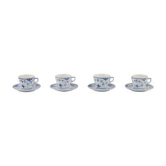 Royal Copenhagen Blue Fluted Half Lace. A set of four coffee cups with saucers.