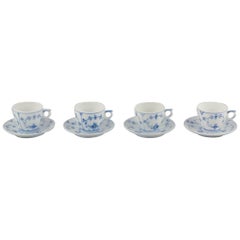 Royal Copenhagen Blue Fluted Plain. Four coffee cups with saucers in porcelain.