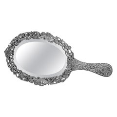 Antique Ornate Victorian sterling silver hand mirror made in 1890
