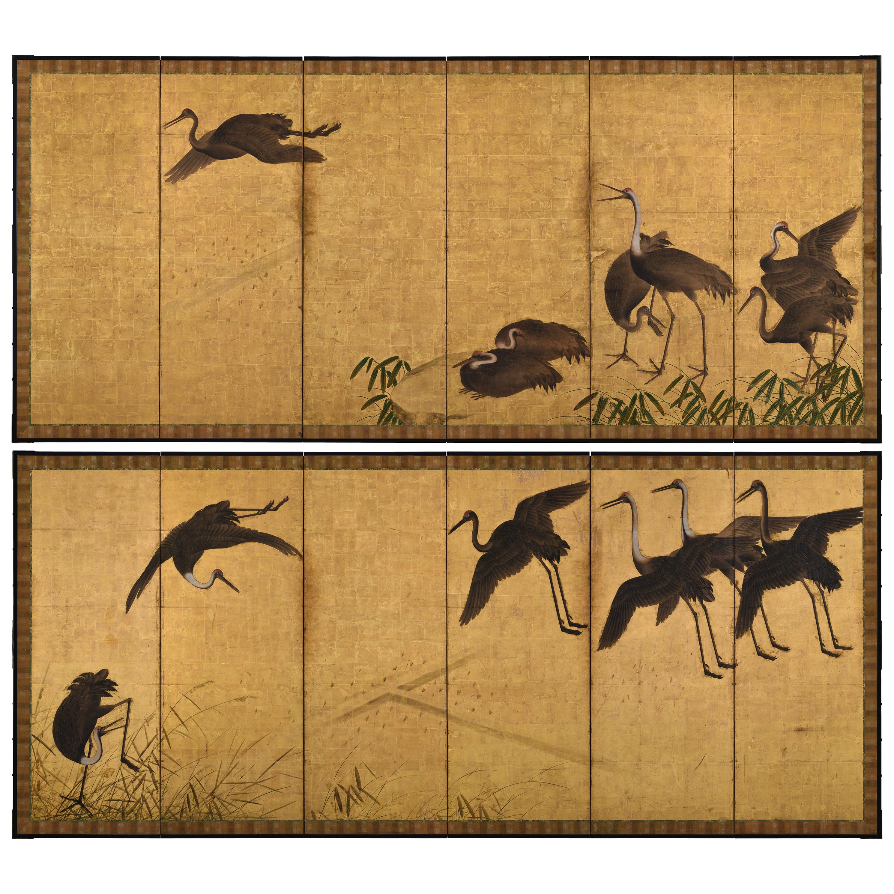 17th Century Japanese Screen Pair. Flock of Cranes. Ink and color on gold leaf.